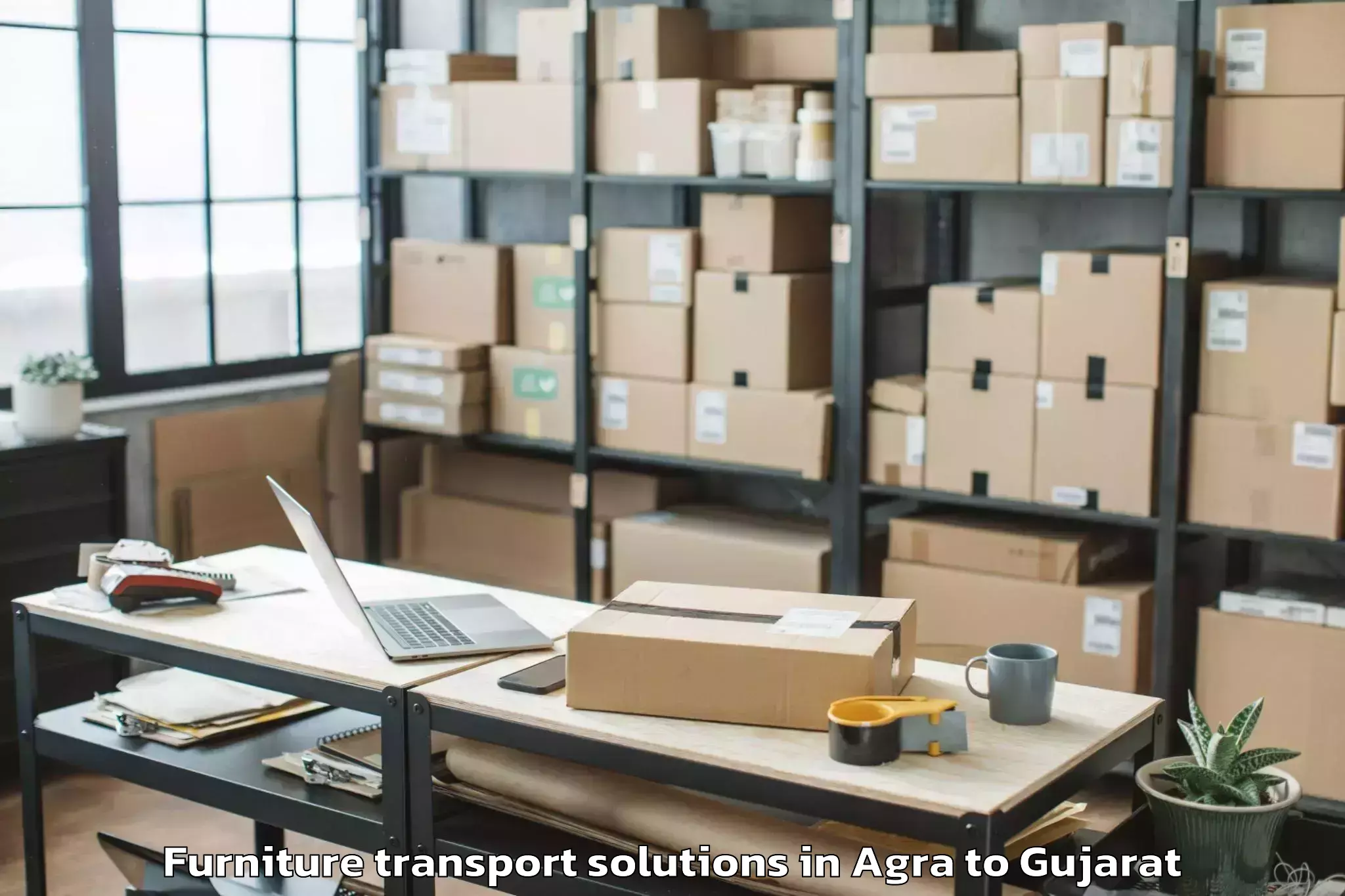 Book Agra to Kanodar Furniture Transport Solutions Online